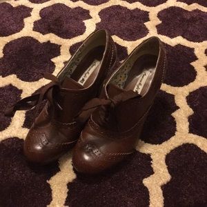 Brown heels with laces to tie